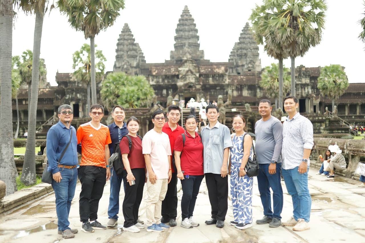 A group photo in front of Angkor Wat